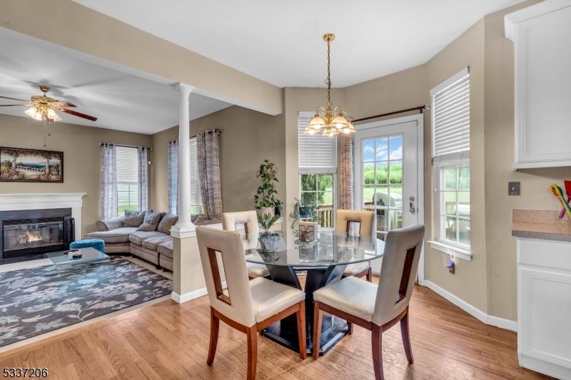 Dining room, Fireplace, Interior, Living room, Pendant Lights, Wood Texture Flooring