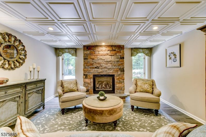 Fireplace, Interior, Living room, Recessed Lighting, Stone Walls, Wood Texture Flooring