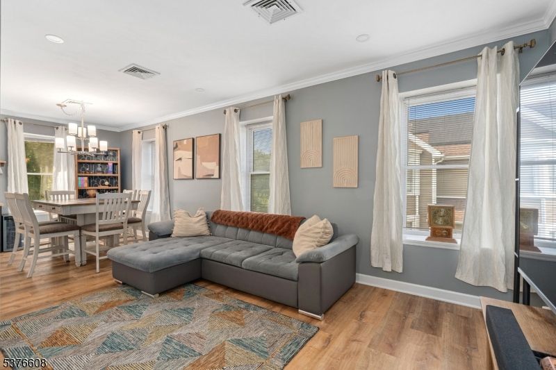 Chandelier, Dining room, Interior, Living room, Recessed Lighting, Wood Texture Flooring