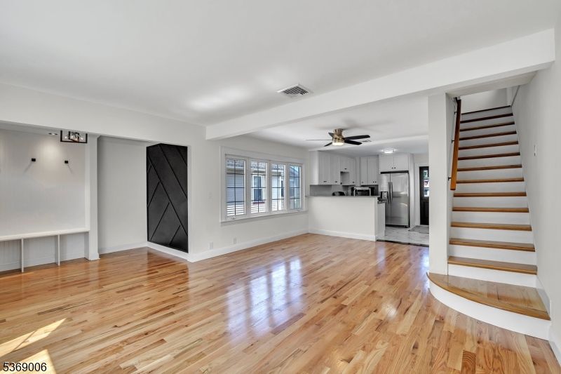 Empty room, Interior, Kitchen, Stainless Steel Appliances, Wood Texture Flooring