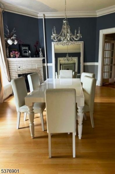 Chandelier, Dining room, Fireplace, Interior, Wood Texture Flooring