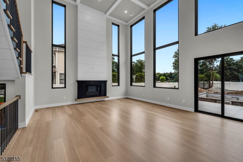 Empty room, Fireplace, Interior, Recessed Lighting, Wood Texture Flooring