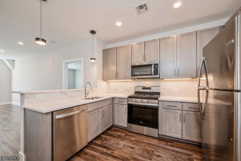 Interior, Kitchen, Pendant Lights, Recessed Lighting, Stainless Steel Appliances, Wood Texture Flooring
