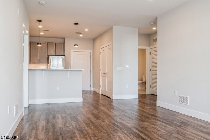 Empty room, Interior, Kitchen, Pendant Lights, Recessed Lighting, Wood Texture Flooring