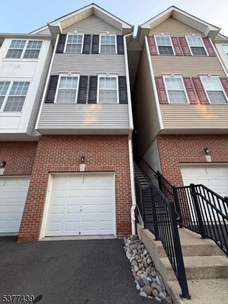 Attached, Exterior, Facade, Brick Facade, Rowhouse