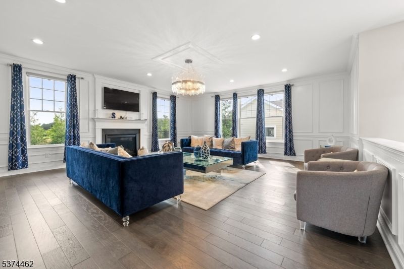 Chandelier, Fireplace, Interior, Living room, Recessed Lighting, Wood Texture Flooring