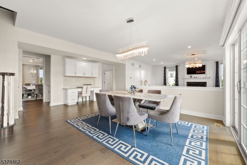 Chandelier, Dining room, Fireplace, Interior, Kitchen, Pendant Lights, Recessed Lighting, Wood Texture Flooring