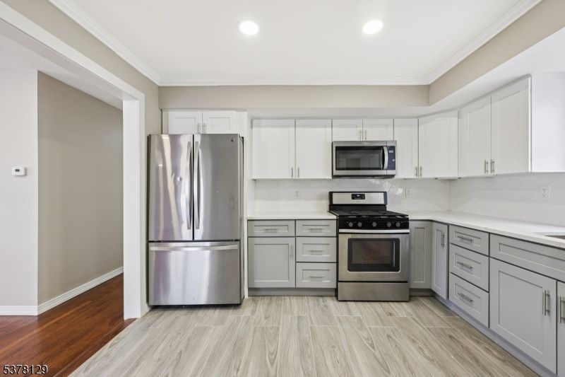 Interior, Kitchen, Recessed Lighting, Stainless Steel Appliances, Wood Texture Flooring