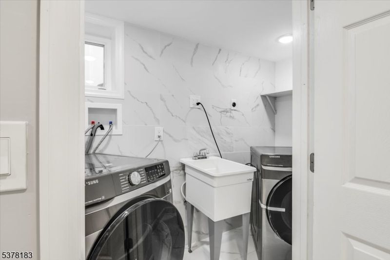 Interior, Marble Walls, Recessed Lighting, Utility Closets, Washer