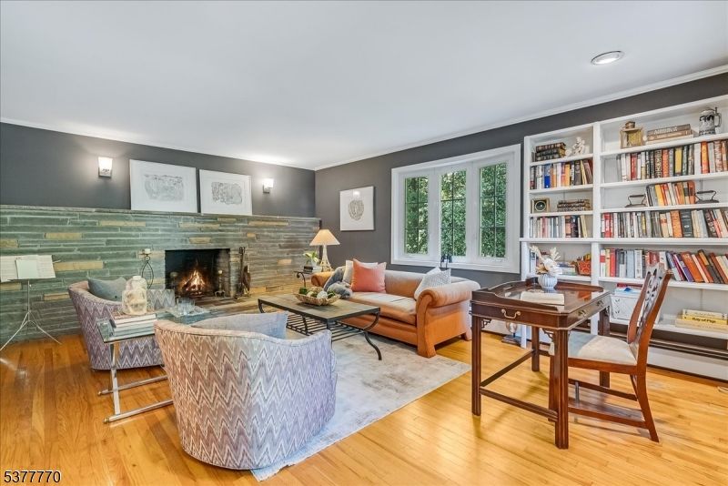 Fireplace, Home Office, Interior, Living room, Recessed Lighting, Stone Walls, Wood Texture Flooring