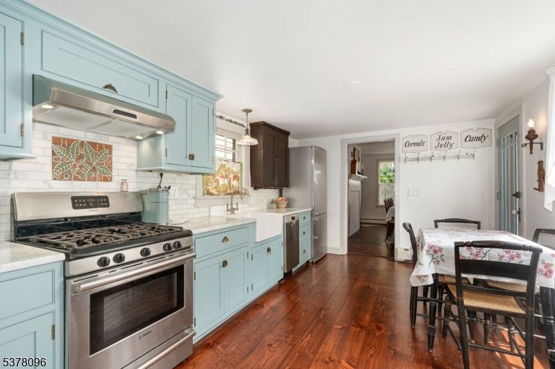 Dining room, Interior, Kitchen, Pendant Lights, Stainless Steel Appliances, Wood Texture Flooring