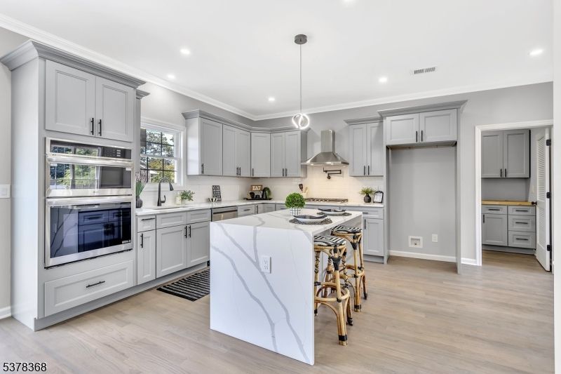 Interior, Kitchen, Pendant Lights, Recessed Lighting, Stainless Steel Appliances, Wood Texture Flooring