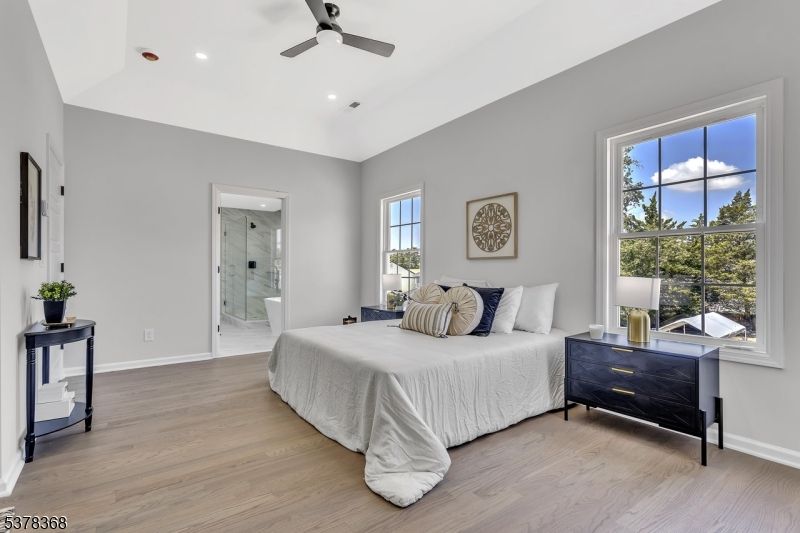 Bathroom, Bedroom, Glass Shower, Interior, Recessed Lighting, Wood Texture Flooring