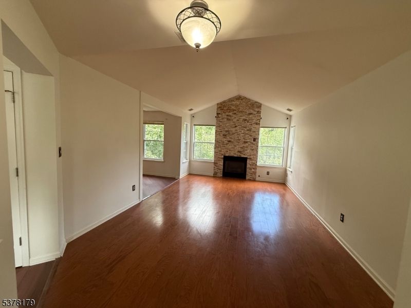 Empty room, Fireplace, Interior, Stone Walls, Wood Texture Flooring