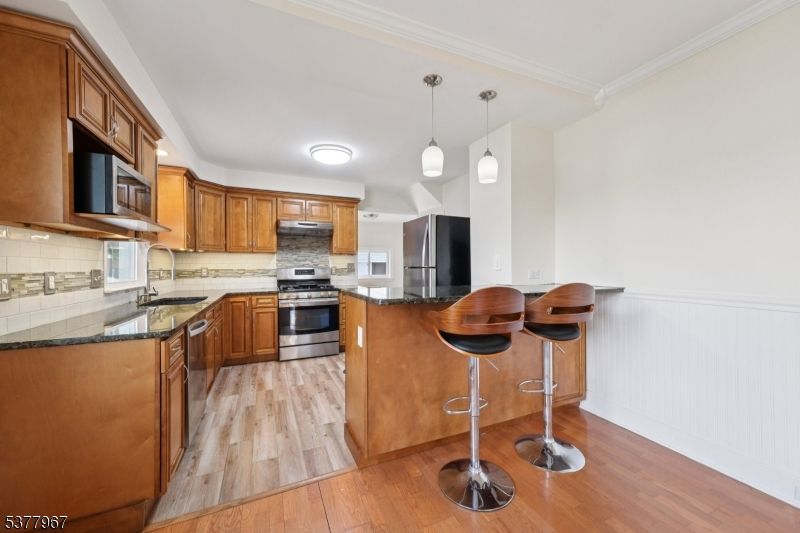 Interior, Kitchen, Pendant Lights, Stainless Steel Appliances, Wood Texture Flooring