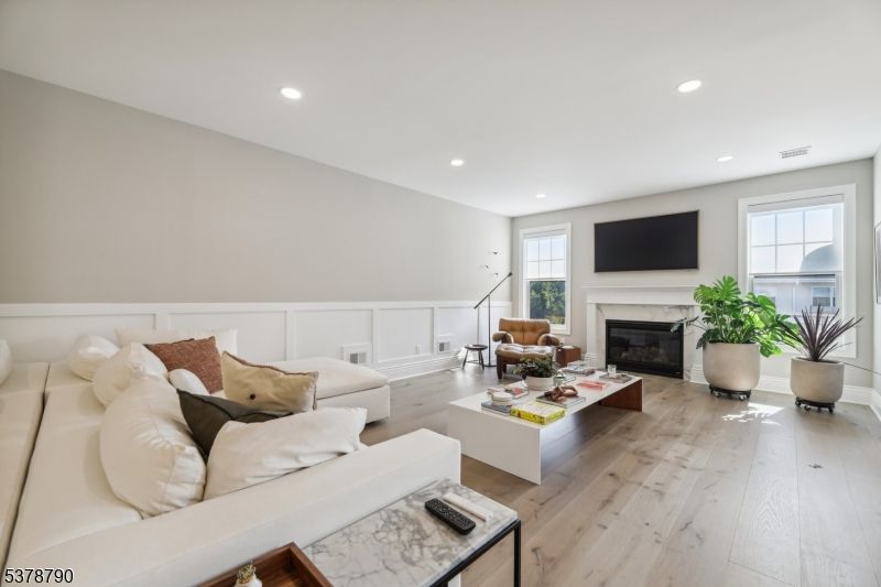 Fireplace, Interior, Living room, Recessed Lighting, Wood Texture Flooring