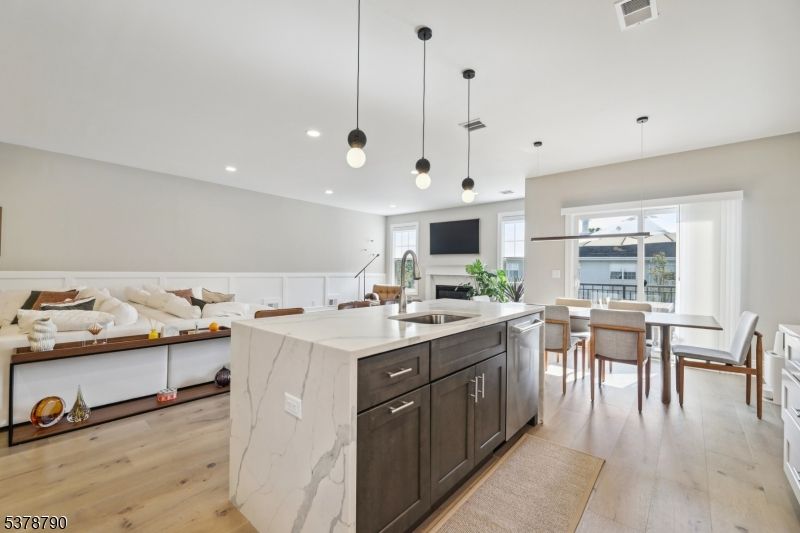 Dining room, Fireplace, Interior, Kitchen, Living room, Pendant Lights, Recessed Lighting, Wood Texture Flooring