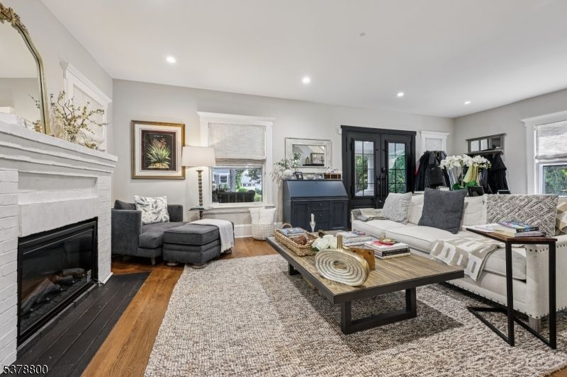 Fireplace, Interior, Living room, Recessed Lighting, Wood Texture Flooring