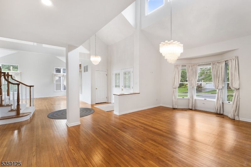 Chandelier, Empty room, Interior, Recessed Lighting, Wood Texture Flooring