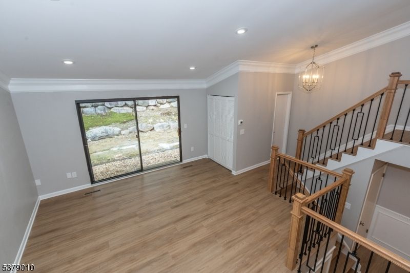Chandelier, Empty room, Interior, Recessed Lighting, Wood Texture Flooring