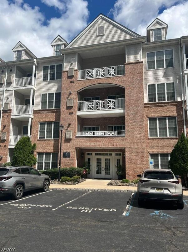 Exterior, Facade, Brick Facade, Condo Building