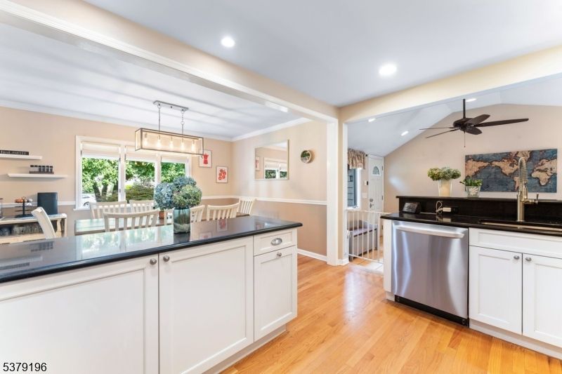 Dining room, Interior, Kitchen, Pendant Lights, Recessed Lighting, Stainless Steel Appliances, Wood Texture Flooring