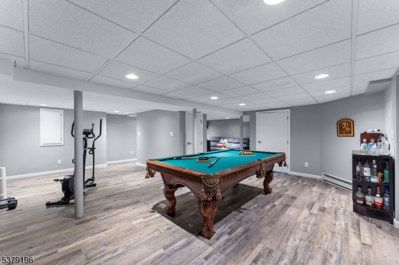 Billiard Table, Fitness Equipment, Game Room, Interior, Recessed Lighting, Wood Texture Flooring
