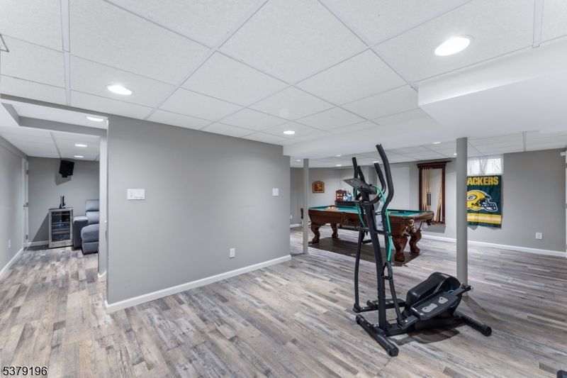 Billiard Table, Fitness Equipment, Game Room, Interior, Recessed Lighting, Wood Texture Flooring
