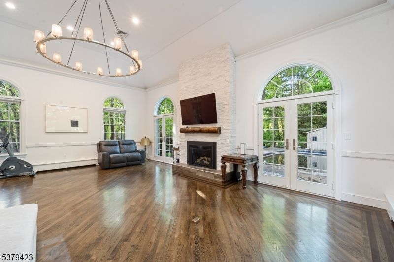 Chandelier, Fireplace, Interior, Recessed Lighting, Wood Texture Flooring
