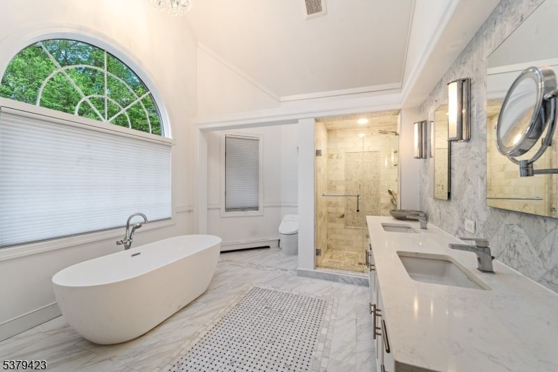 Bathroom, Dual Sink Vanities, Free Standing Baths, Glass Shower, Interior, Marble, Marble Walls, Recessed Lighting