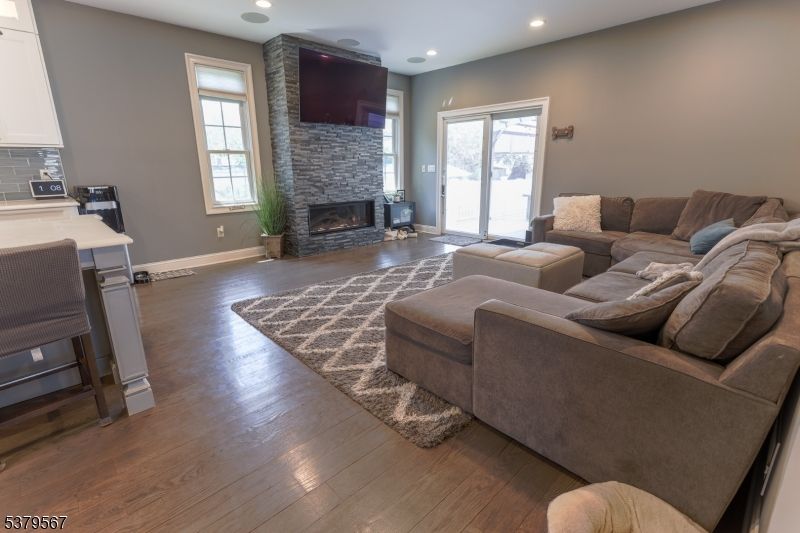 Fireplace, Interior, Living room, Recessed Lighting, Wood Texture Flooring