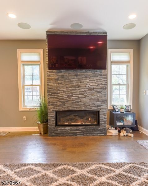 Fireplace, Interior, Recessed Lighting, Stone Walls, Wood Texture Flooring