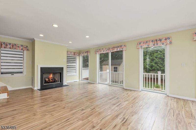 Empty room, Fireplace, Interior, Recessed Lighting, Wood Texture Flooring