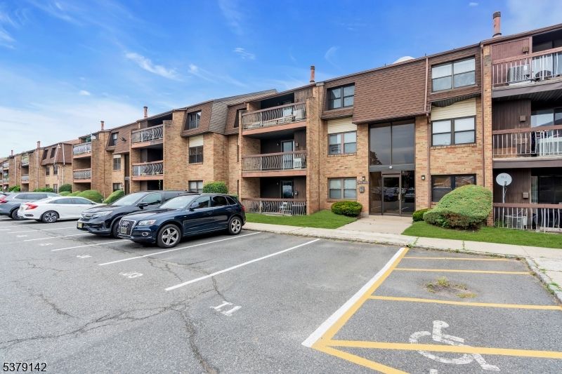 Exterior, Facade, Brick Facade, Condo Building