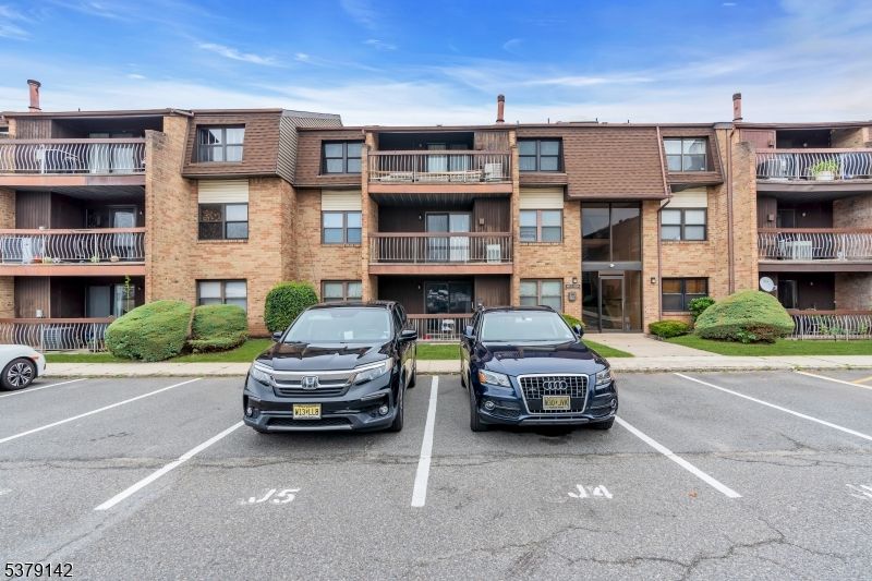 Exterior, Facade, Brick Facade, Condo Building