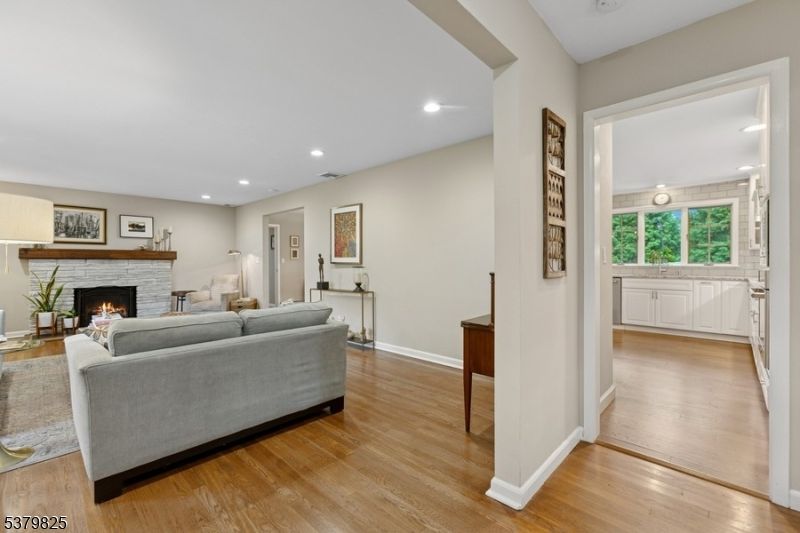 Fireplace, Interior, Living room, Recessed Lighting, Wood Texture Flooring