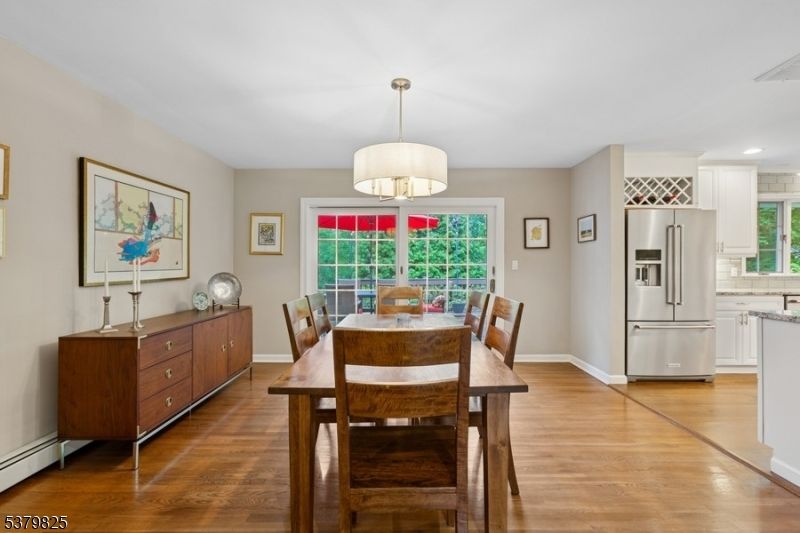 Dining room, Interior, Kitchen, Recessed Lighting, Stainless Steel Appliances, Wood Texture Flooring