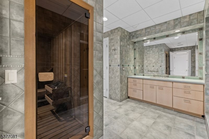Bathroom, Dual Sink Vanities, Glass Shower, Interior, Recessed Lighting, Sauna Room
