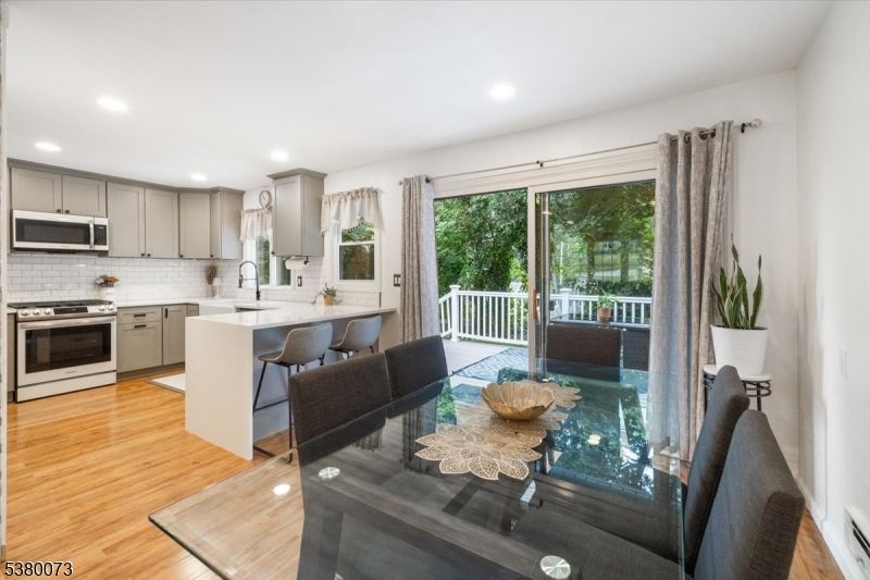 Dining room, Interior, Kitchen, Recessed Lighting, Stainless Steel Appliances, Wood Texture Flooring