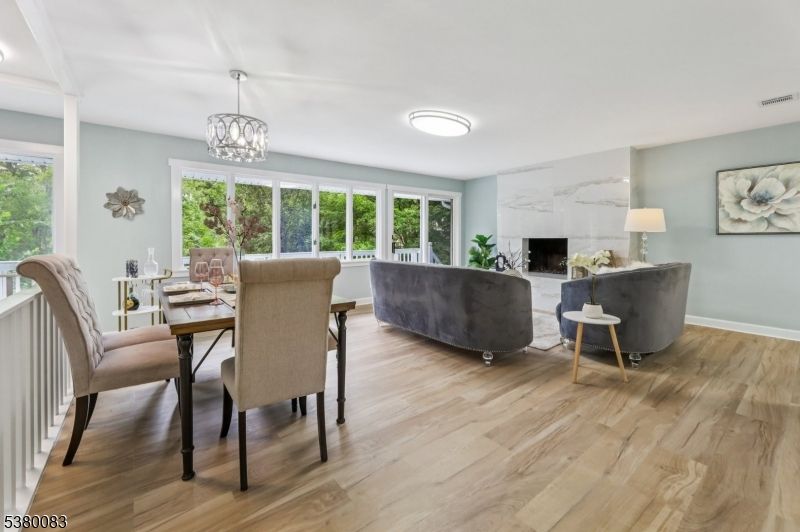 Chandelier, Dining room, Fireplace, Interior, Living room, Wood Texture Flooring