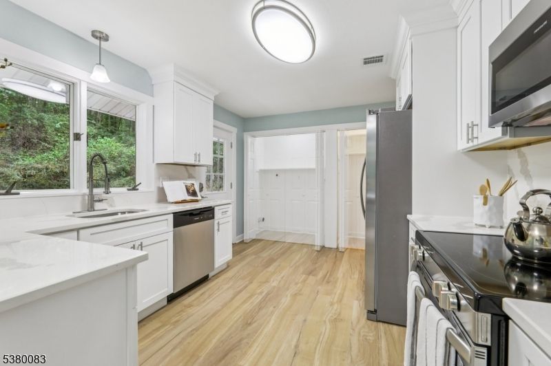Interior, Kitchen, Pendant Lights, Stainless Steel Appliances, Wood Texture Flooring