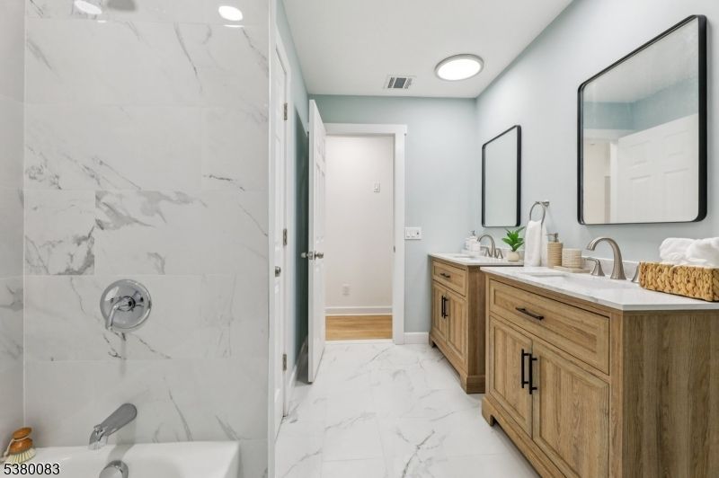 Bathroom, Dual Sink Vanities, Interior, Marble, Marble Walls, Recessed Lighting