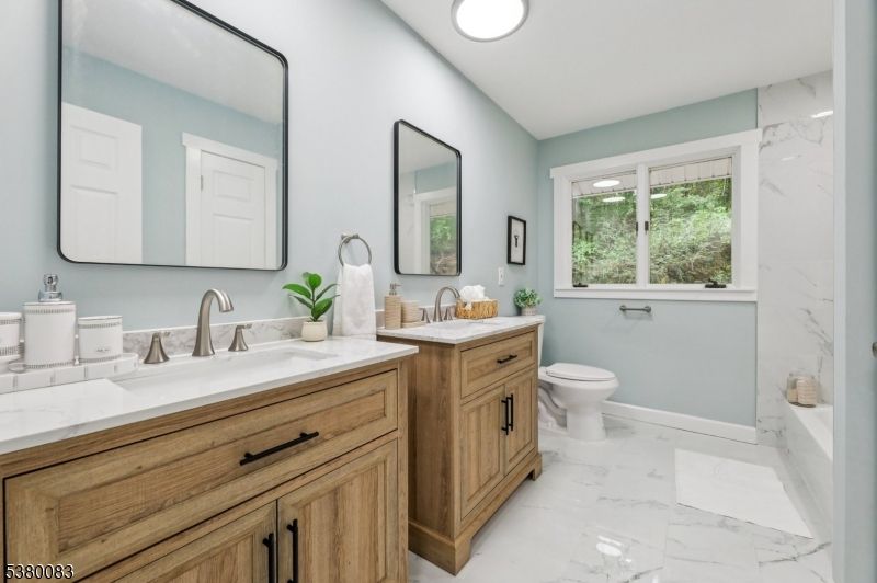 Bathroom, Dual Sink Vanities, Interior, Marble, Marble Walls, Recessed Lighting
