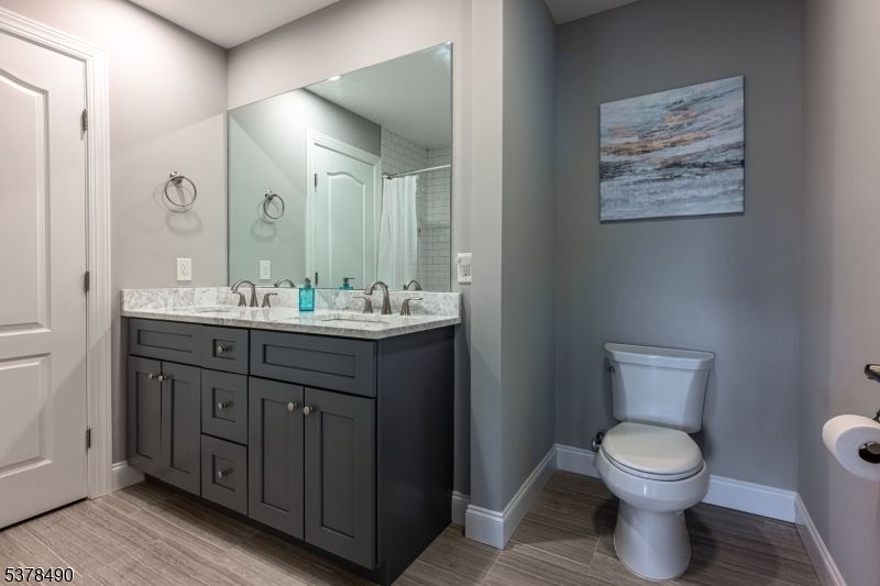 Bathroom, Dual Sink Vanities, Interior, Recessed Lighting, Wood Texture Flooring