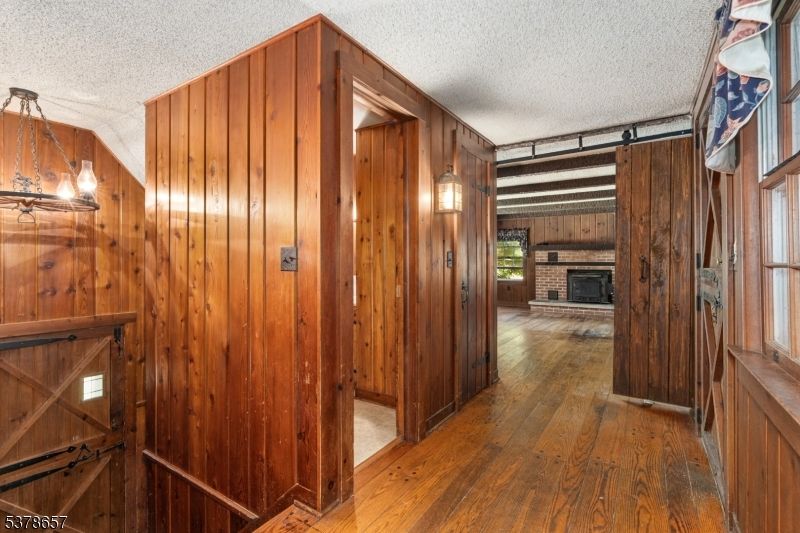 Fireplace, Interior, Pendant Lights, Wood Texture Flooring, Wooden Walls