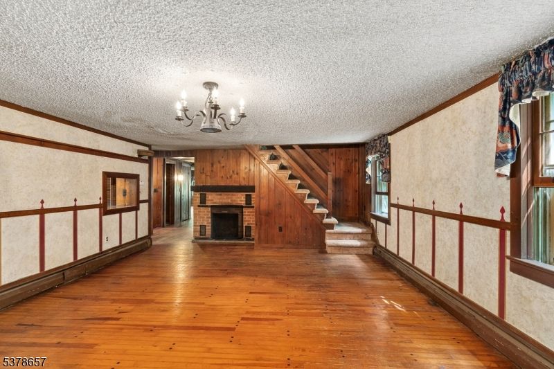 Chandelier, Fireplace, Interior, Wood Texture Flooring, Wooden Walls