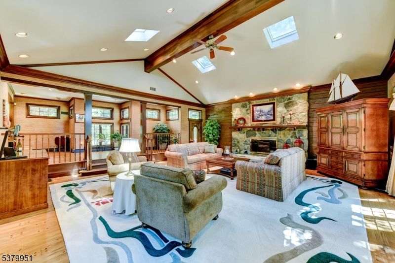 Fireplace, Interior, Living room, Recessed Lighting, Stone Walls, Wooden Beams, Wood Texture Flooring