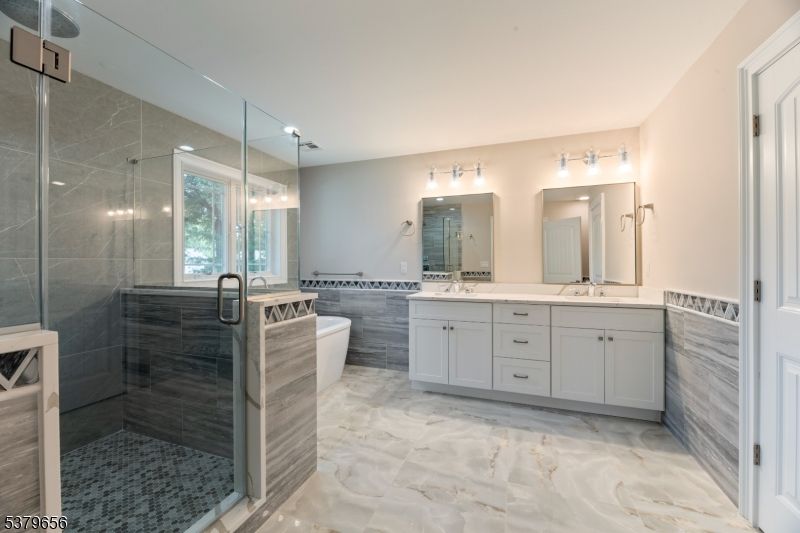 Bathroom, Dual Sink Vanities, Free Standing Baths, Glass Shower, Interior, Marble, Marble Walls