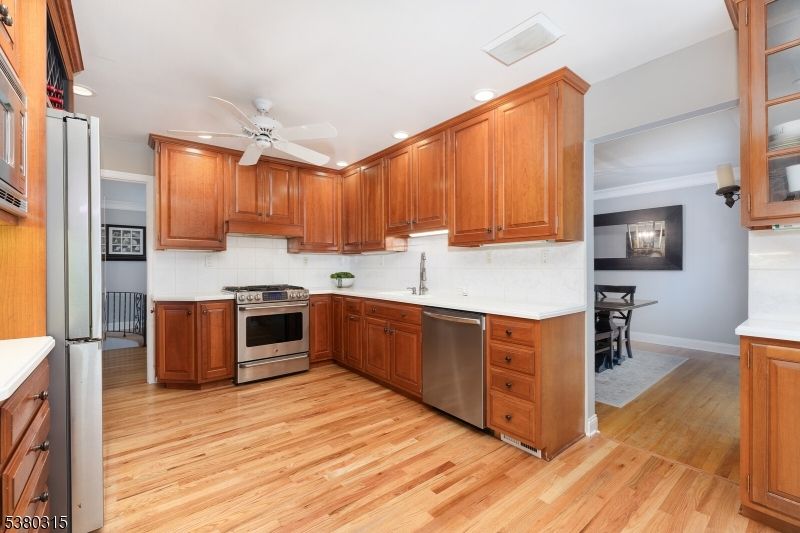 Dining room, Interior, Kitchen, Recessed Lighting, Stainless Steel Appliances, Wood Texture Flooring