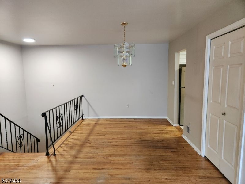 Chandelier, Empty room, Interior, Recessed Lighting, Wood Texture Flooring